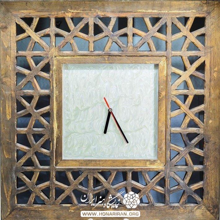 ساعت دیواری مشبک چوب مدل آرامش