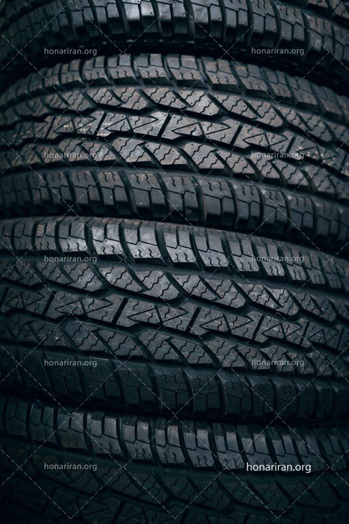 عکس با کیفیت لاستیک های چیده شده بر روی یکدیگر
