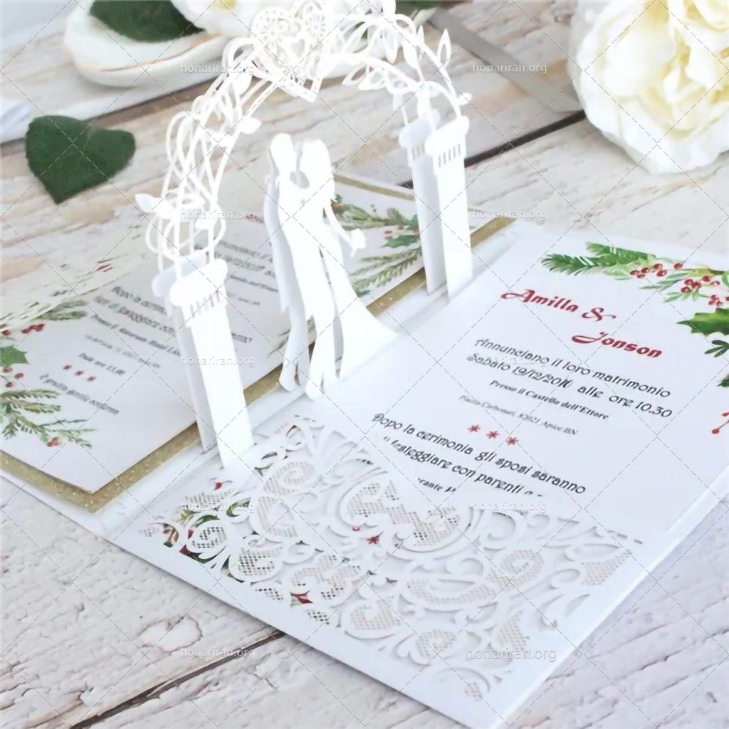 عکس با کیفیت کارت عروسی سه بعدی با طراحی عروس و داماد به رنگ سفید
