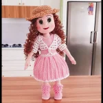 عروسک کاموایی دختر با لباس صورتی