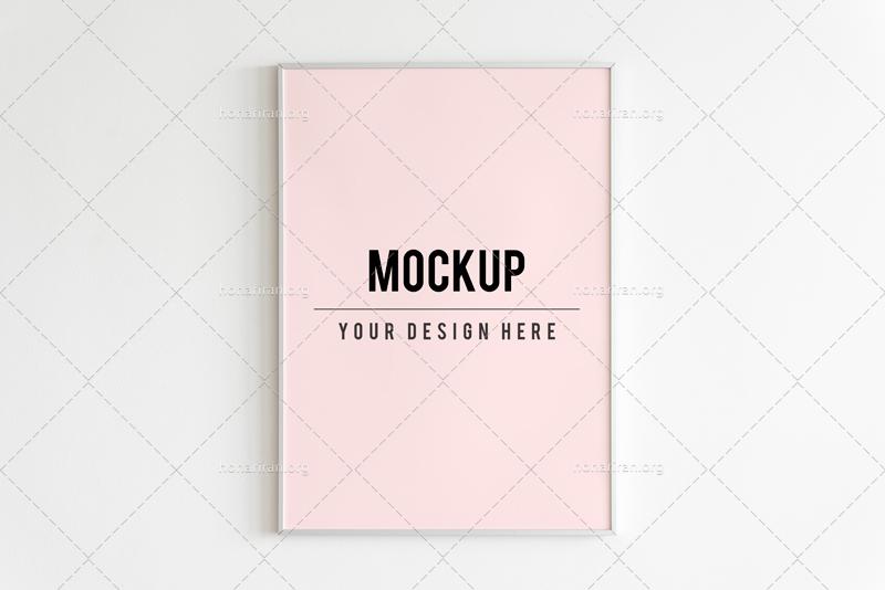 طرح موکاپ آماده لایه باز قاب عکس روی دیوار سفید