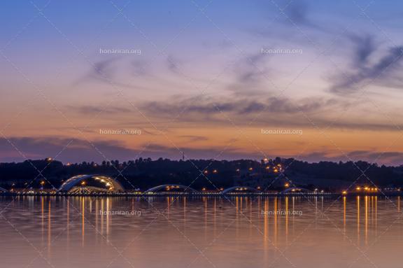 قطعه عکس غروب خورشید و چراغ ها