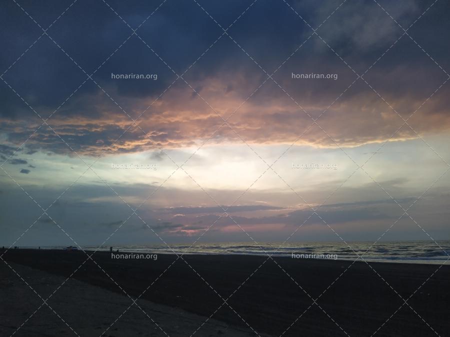 قطعه عکس ابرها و غروب ساحل